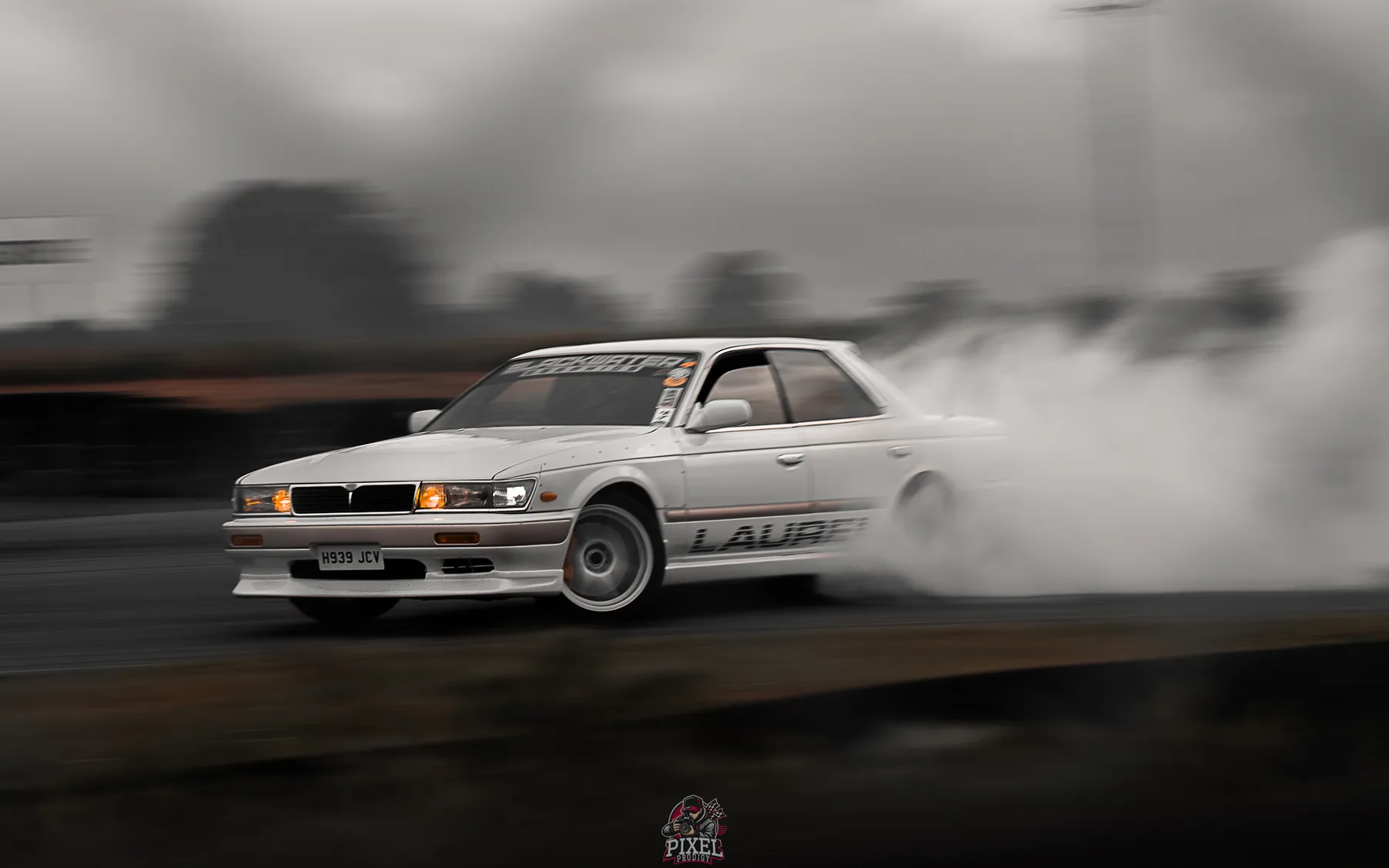White Lexus drifting on track